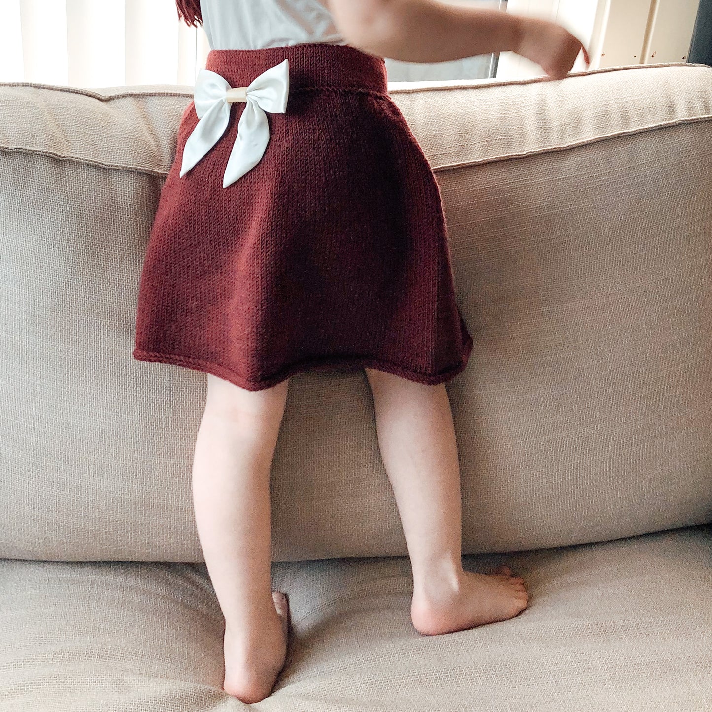 Ailo nisselue og Jenny skjørt (9 mnd - 4 år)