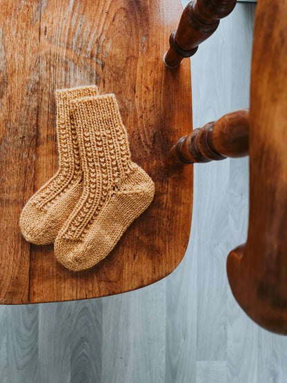 Amalie lue, hals, tykke votter og tykke sokker (1-12 år)